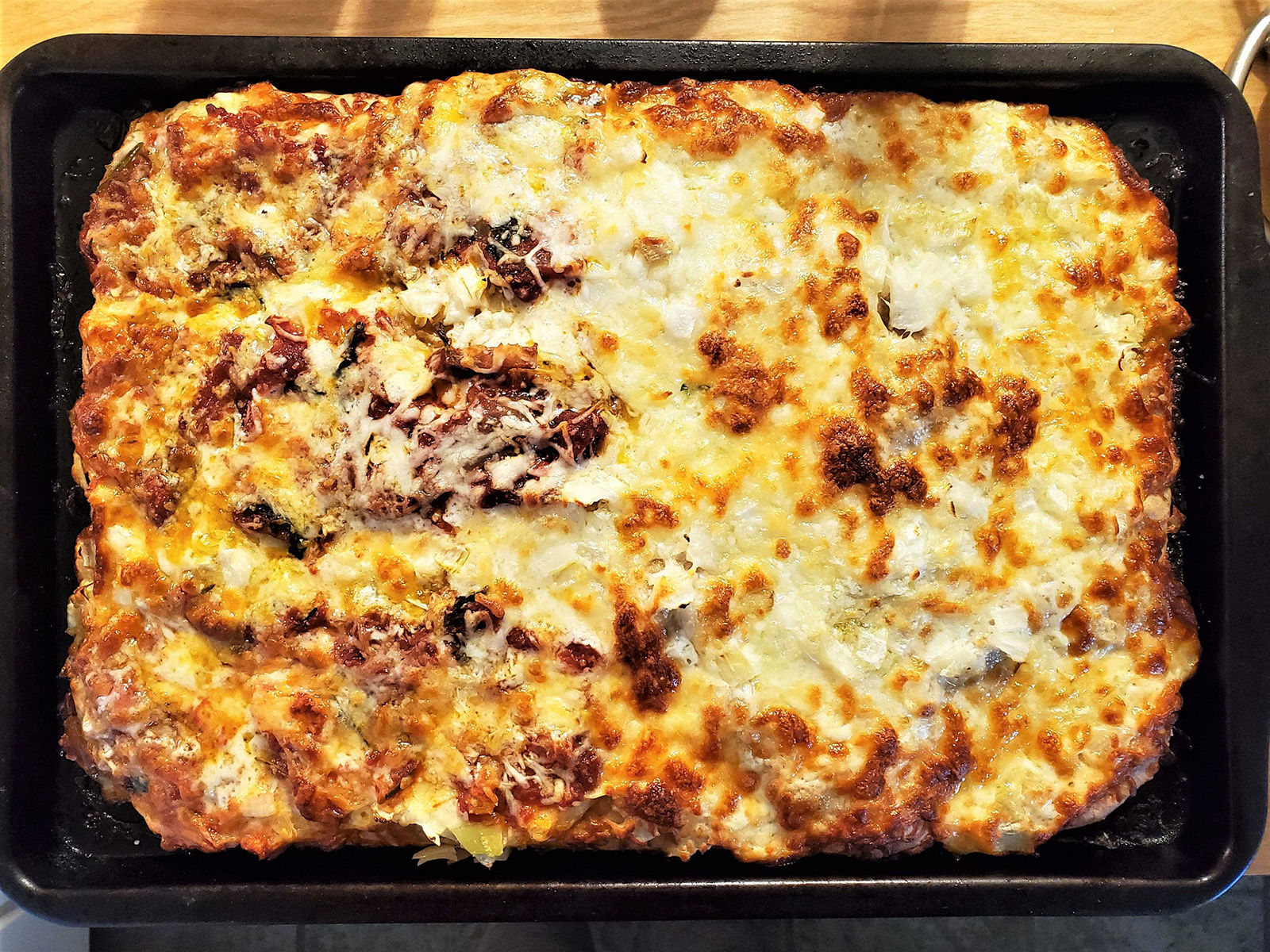 Pizza al taglio is a thick-crust pizza popular in Rome.
